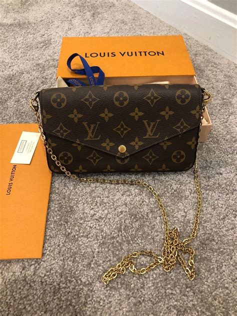 louis vuitton black shoulder bag with gold chain|black louis vuitton side bag.